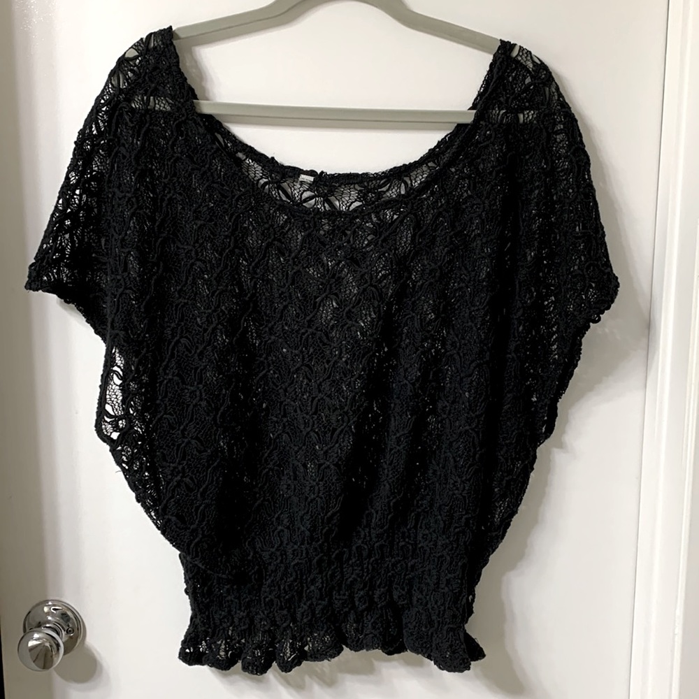 Free people black crochet top. Tag cut off but still gorgeous.